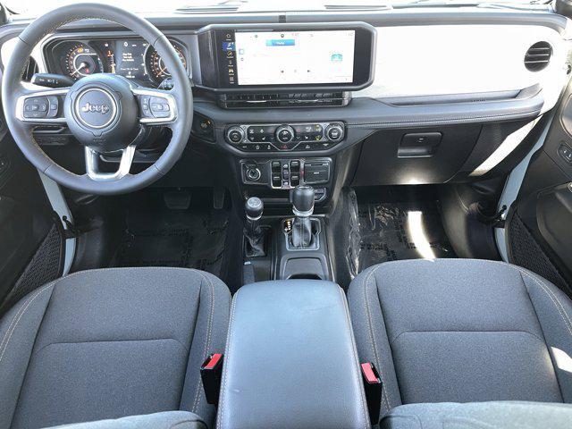 used 2024 Jeep Wrangler car, priced at $42,938