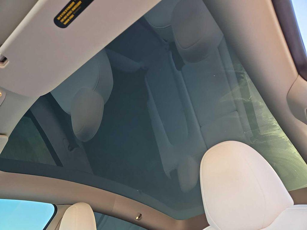 used 2023 Tesla Model Y car, priced at $31,000