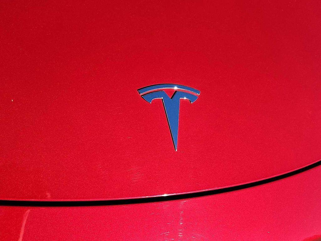 used 2023 Tesla Model Y car, priced at $31,000
