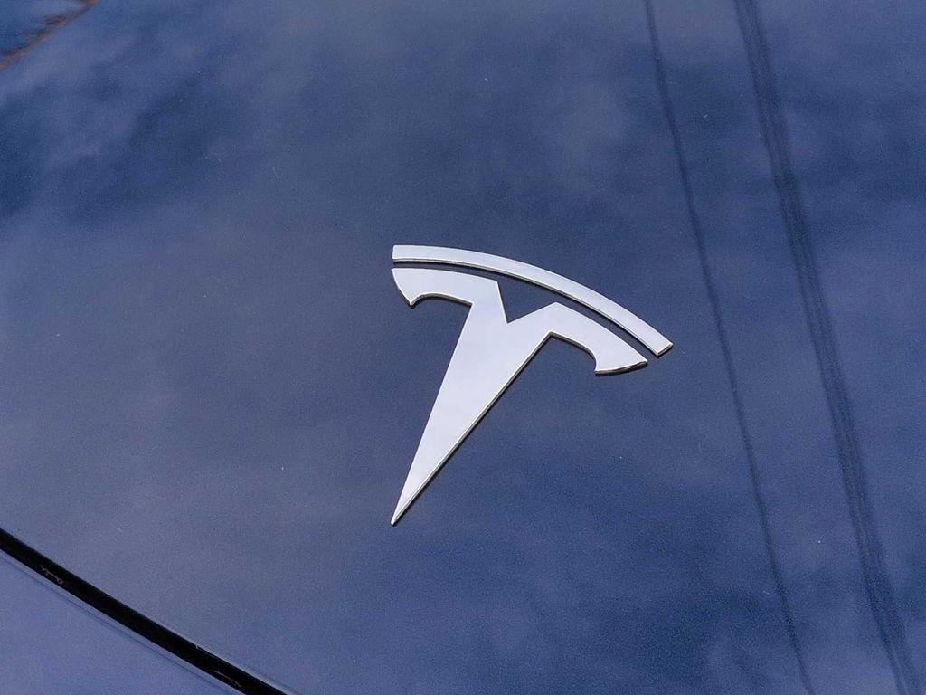 used 2023 Tesla Model 3 car, priced at $25,000