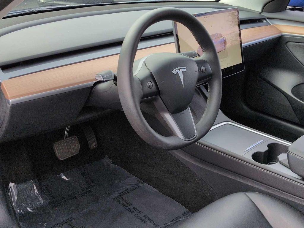 used 2023 Tesla Model 3 car, priced at $25,000