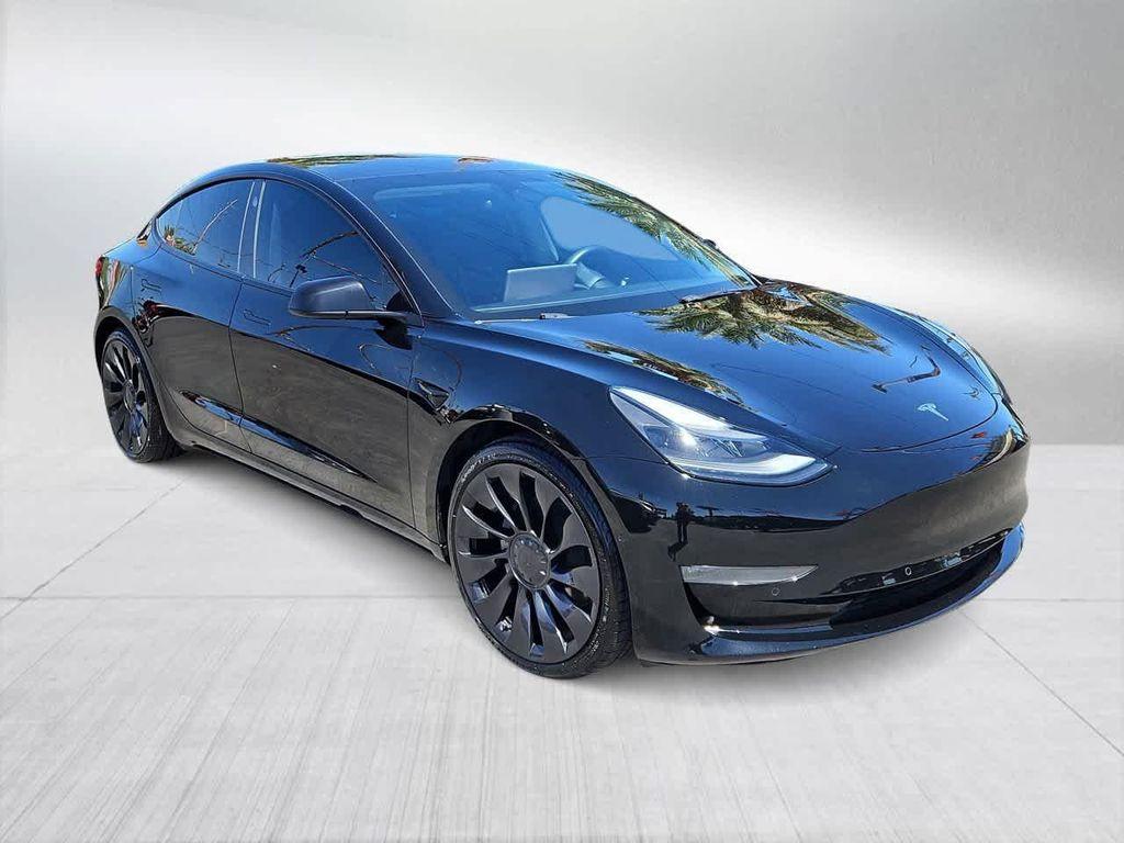 used 2022 Tesla Model 3 car, priced at $22,500