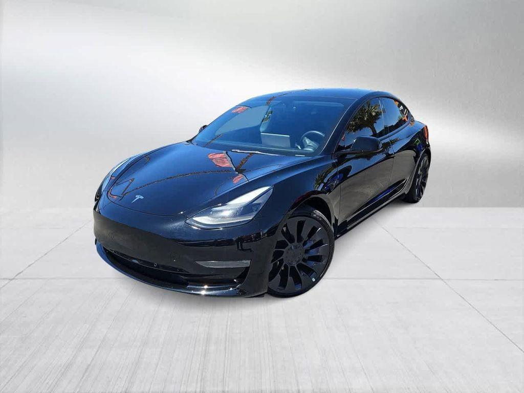 used 2022 Tesla Model 3 car, priced at $22,500