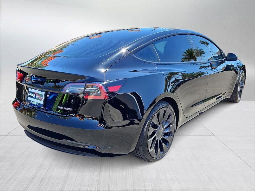 used 2022 Tesla Model 3 car, priced at $22,500