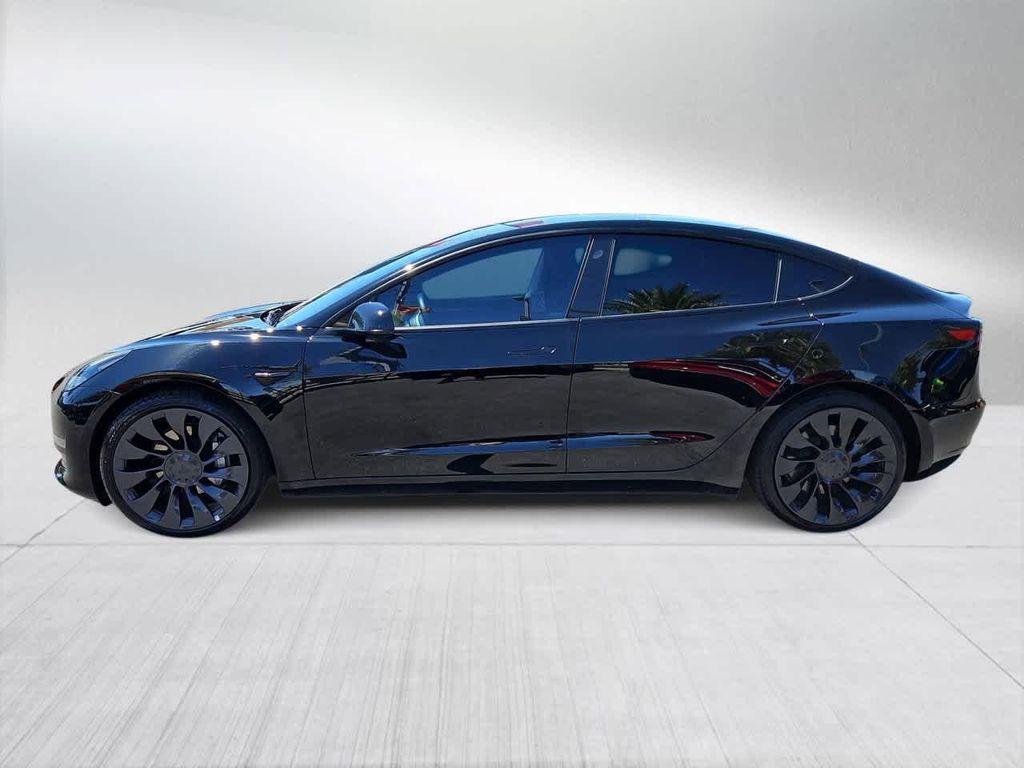 used 2022 Tesla Model 3 car, priced at $22,500