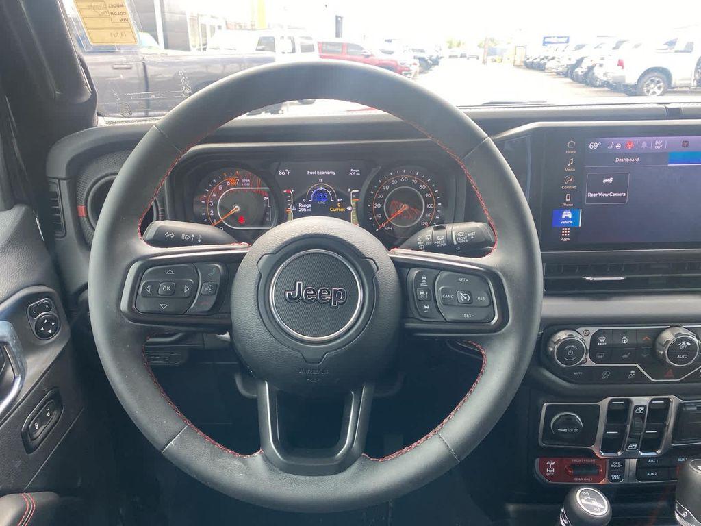 used 2024 Jeep Wrangler car, priced at $49,000