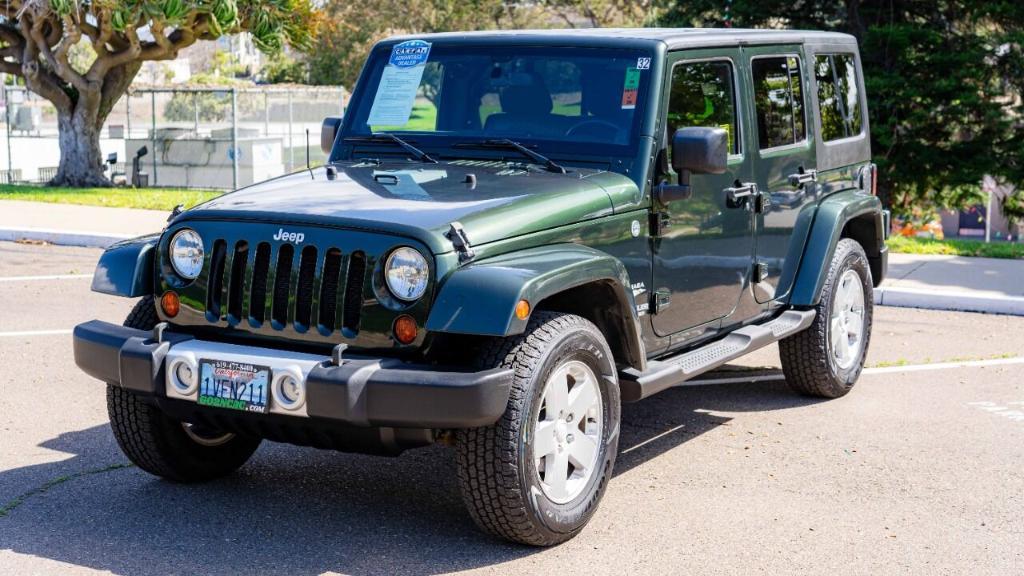used 2011 Jeep Wrangler Unlimited car, priced at $19,395