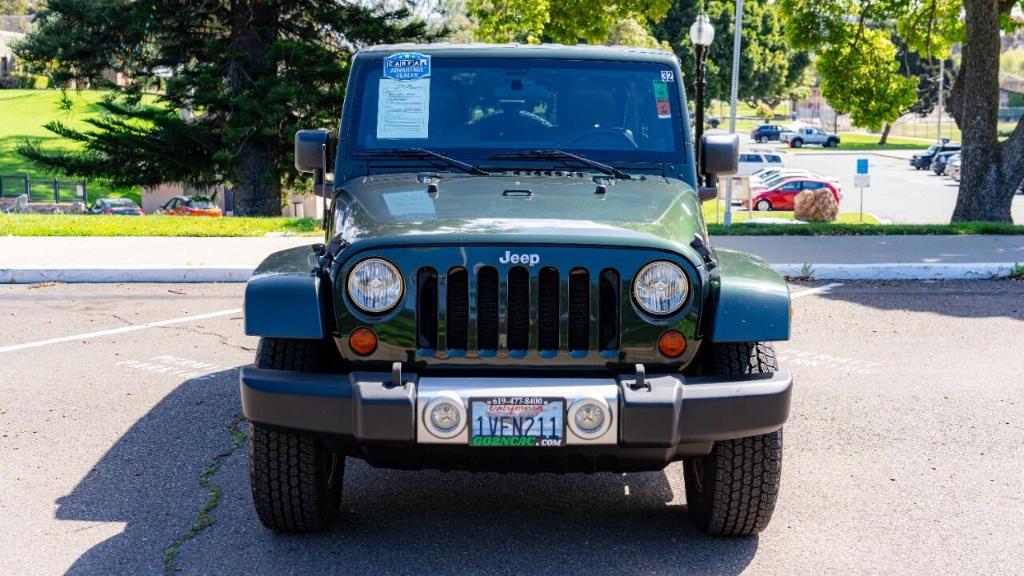 used 2011 Jeep Wrangler Unlimited car, priced at $19,395