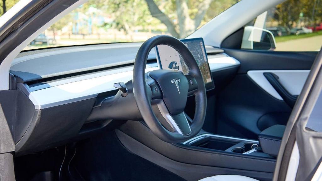 used 2021 Tesla Model Y car, priced at $28,995