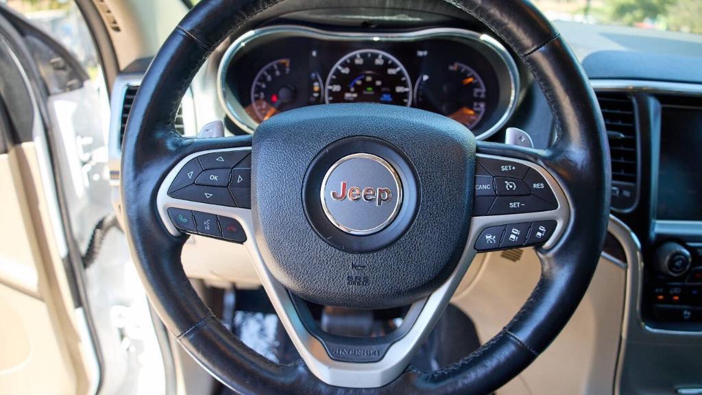 used 2014 Jeep Grand Cherokee car, priced at $11,995