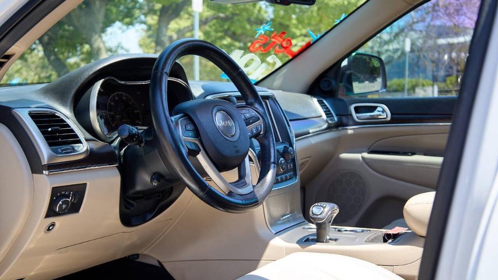 used 2014 Jeep Grand Cherokee car, priced at $11,995