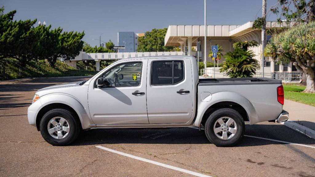 used 2013 Nissan Frontier car, priced at $16,995