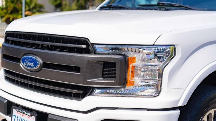 used 2018 Ford F-150 car, priced at $26,995