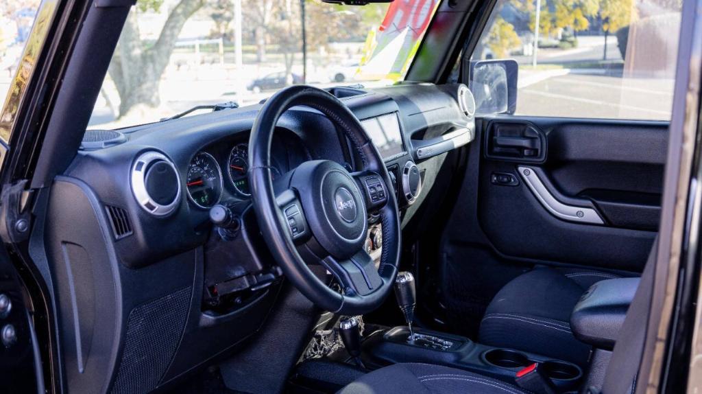 used 2015 Jeep Wrangler Unlimited car, priced at $18,995