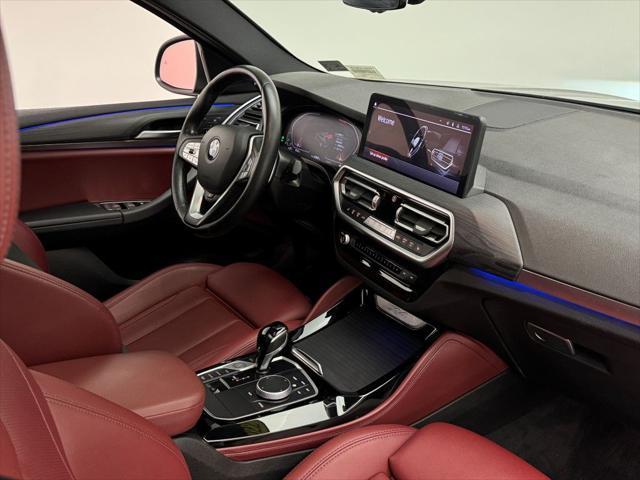 used 2022 BMW X4 car, priced at $33,900