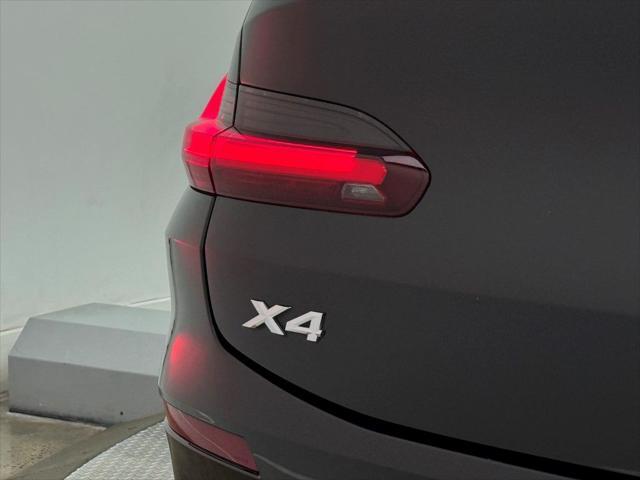 used 2022 BMW X4 car, priced at $33,900