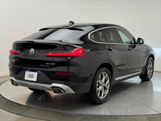 used 2022 BMW X4 car, priced at $33,900