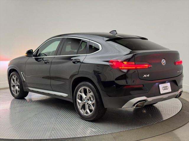 used 2022 BMW X4 car, priced at $33,900