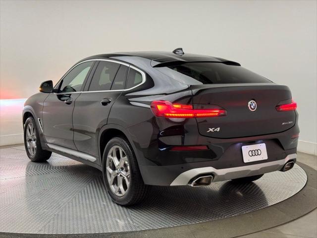 used 2022 BMW X4 car, priced at $33,900
