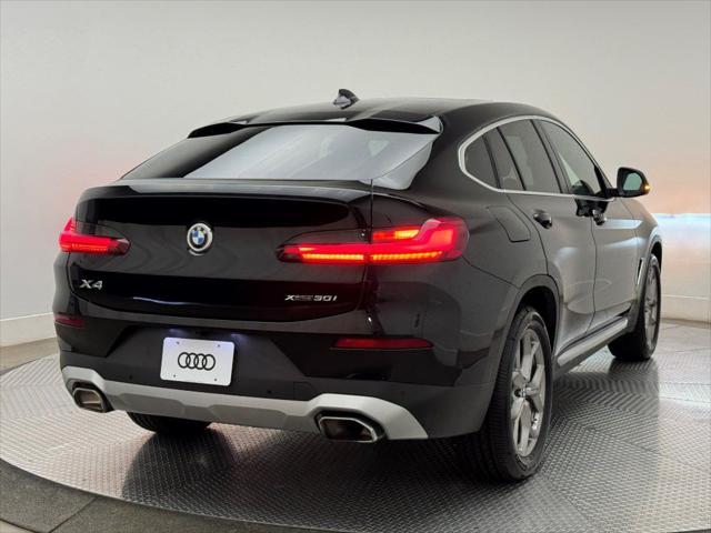 used 2022 BMW X4 car, priced at $33,900