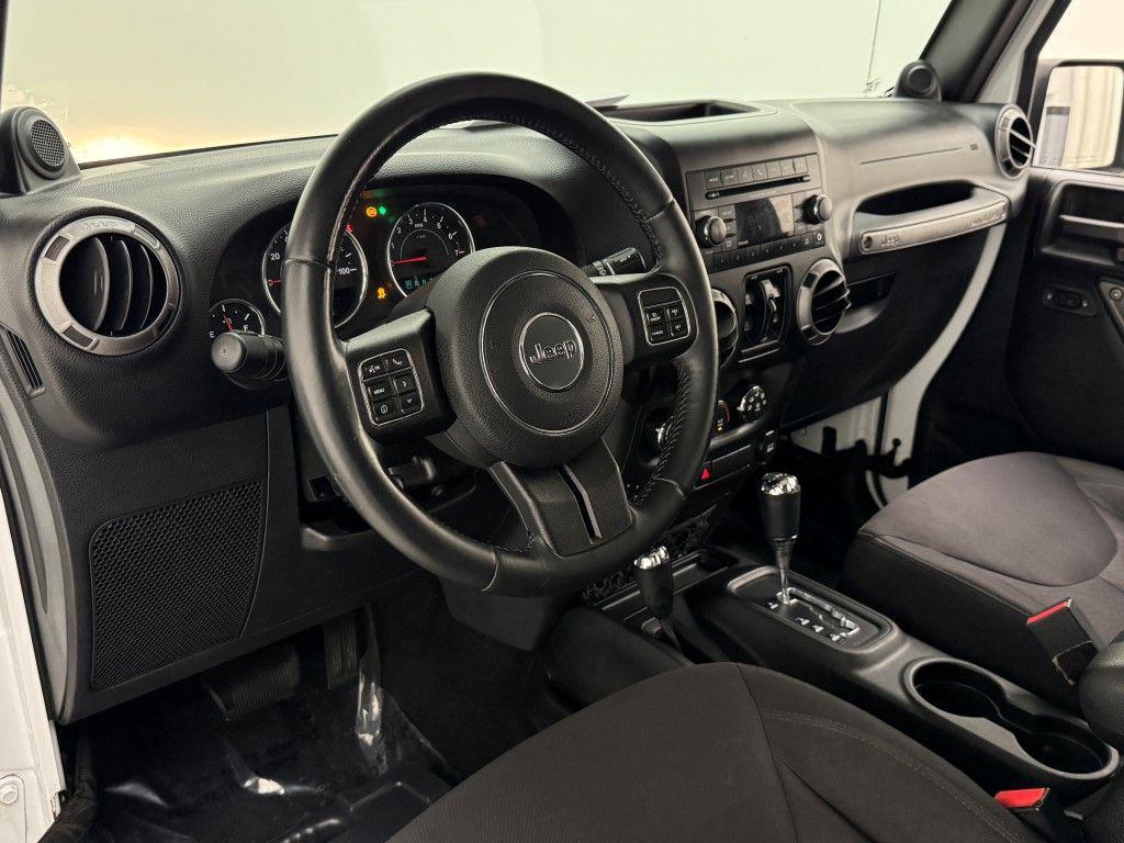 used 2014 Jeep Wrangler Unlimited car, priced at $13,501