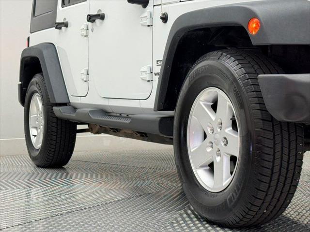 used 2014 Jeep Wrangler Unlimited car, priced at $13,500