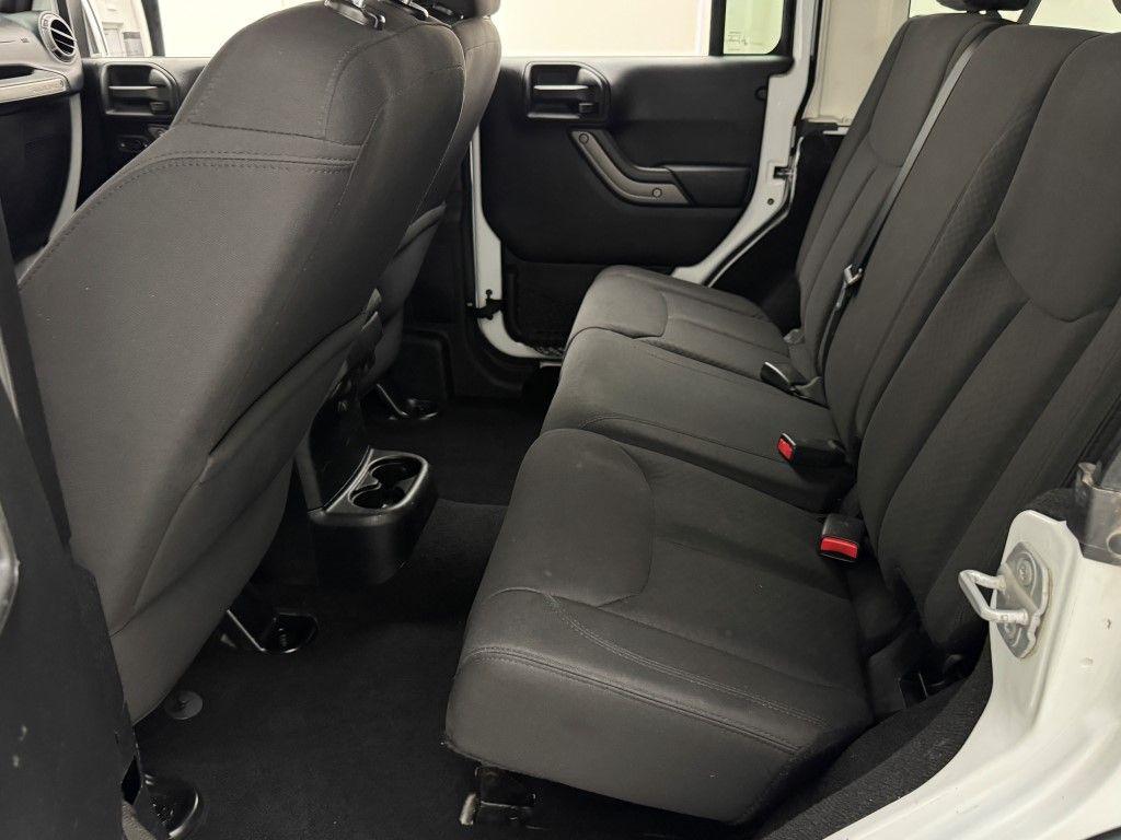 used 2014 Jeep Wrangler Unlimited car, priced at $13,501