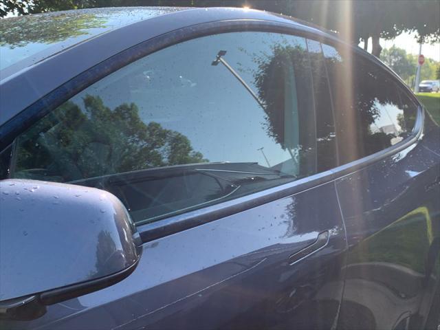 used 2022 Tesla Model Y car, priced at $23,900