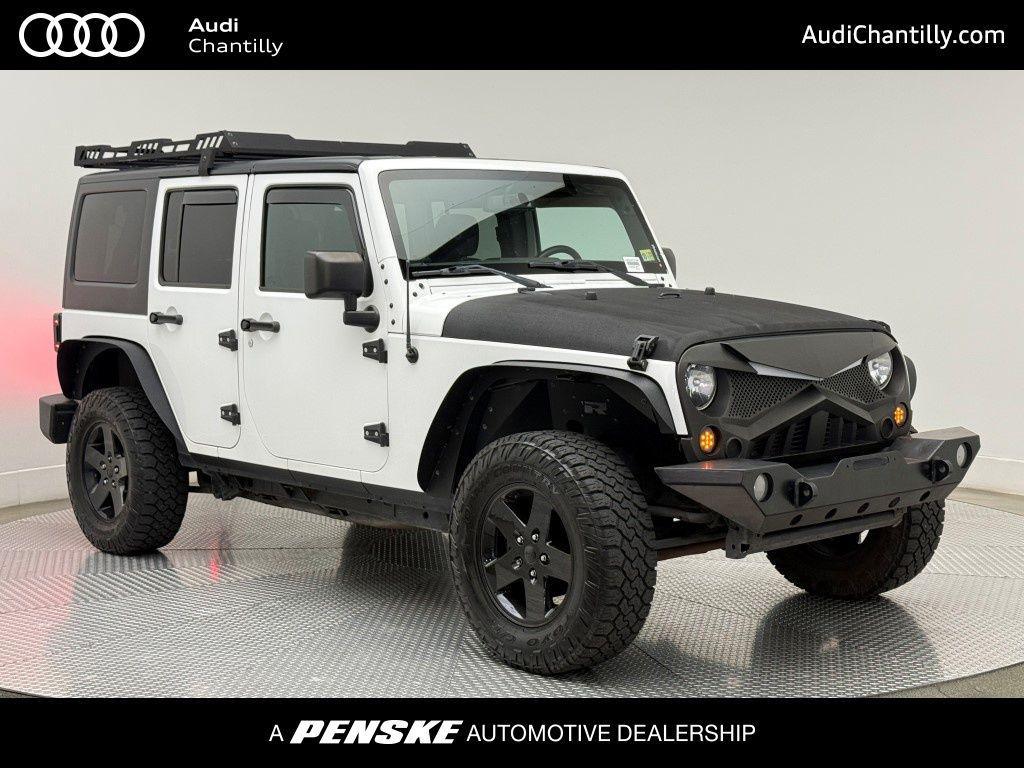 used 2016 Jeep Wrangler Unlimited car, priced at $16,881