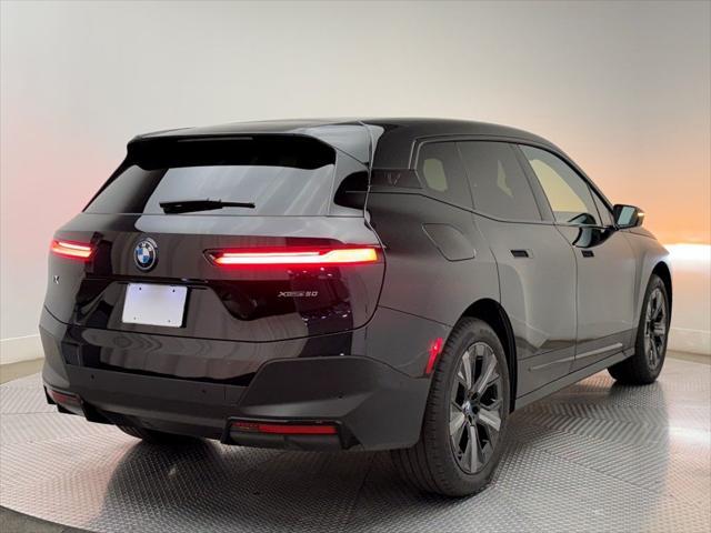 used 2025 BMW iX car, priced at $64,900