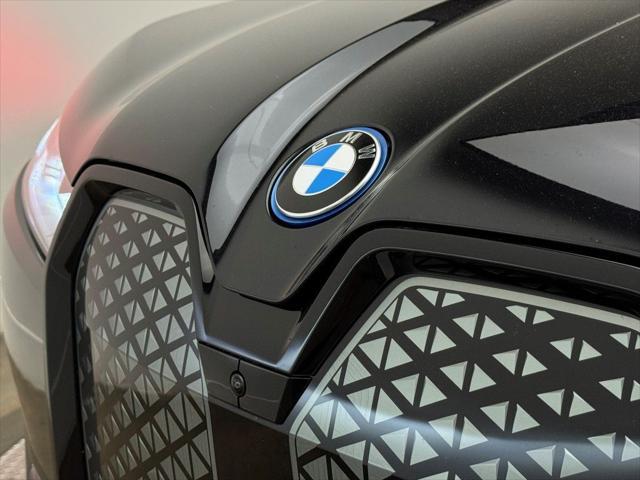 used 2025 BMW iX car, priced at $64,900