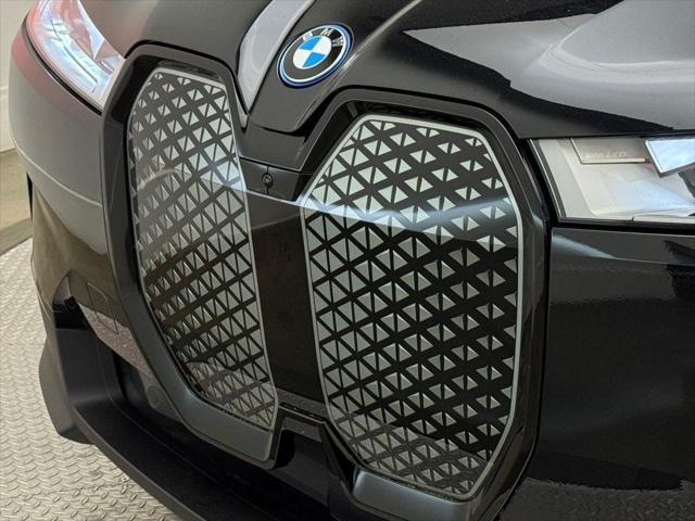 used 2025 BMW iX car, priced at $64,900