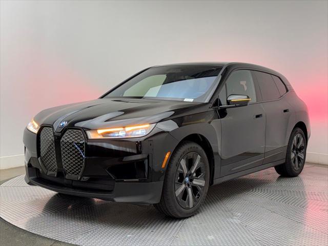 used 2025 BMW iX car, priced at $64,900