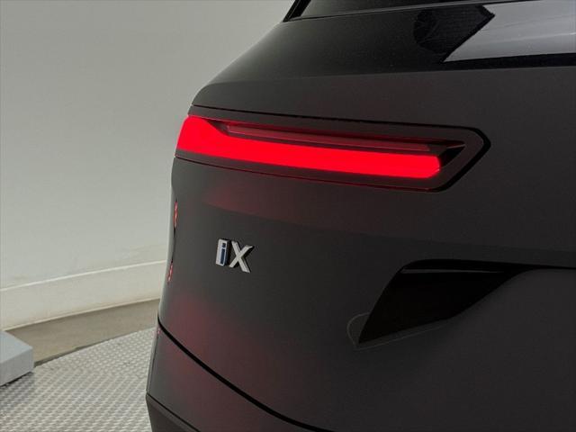 used 2025 BMW iX car, priced at $64,900