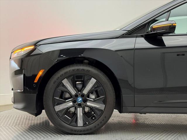 used 2025 BMW iX car, priced at $64,900
