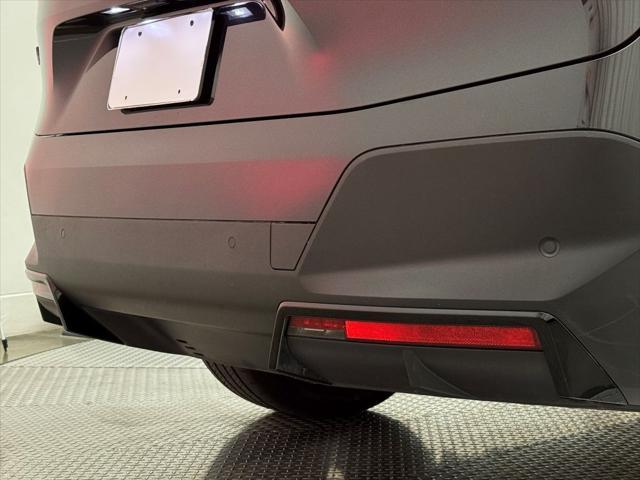 used 2025 BMW iX car, priced at $64,900