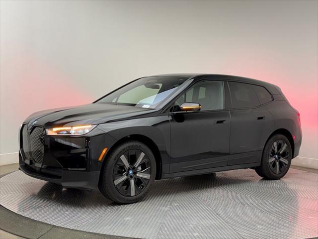 used 2025 BMW iX car, priced at $64,900
