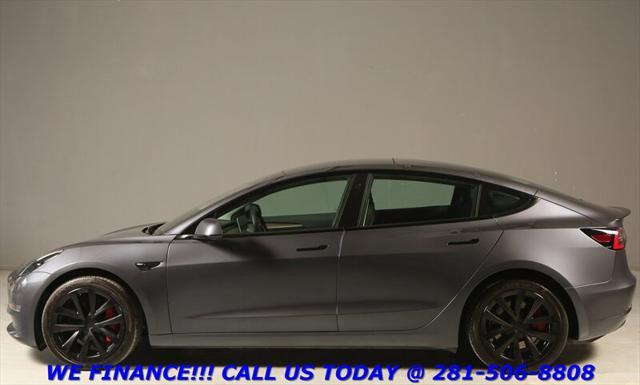 used 2023 Tesla Model 3 car, priced at $30,895