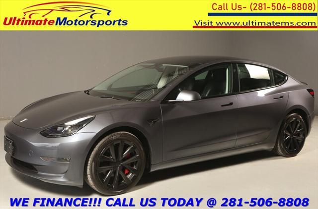 used 2023 Tesla Model 3 car, priced at $30,895