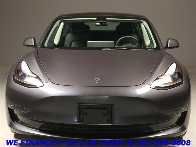 used 2023 Tesla Model 3 car, priced at $30,895