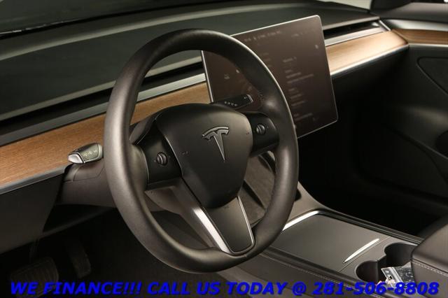 used 2023 Tesla Model 3 car, priced at $30,895