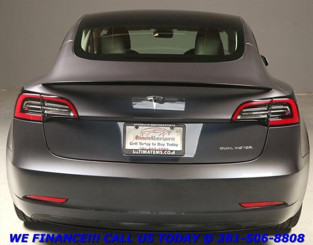 used 2023 Tesla Model 3 car, priced at $30,895