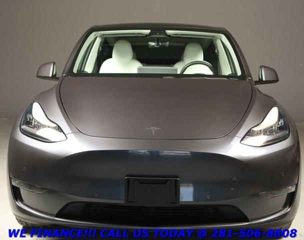 used 2021 Tesla Model Y car, priced at $28,995