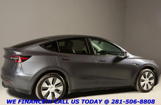 used 2021 Tesla Model Y car, priced at $28,995