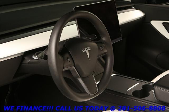 used 2021 Tesla Model Y car, priced at $28,995