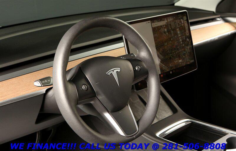 used 2023 Tesla Model Y car, priced at $22,995
