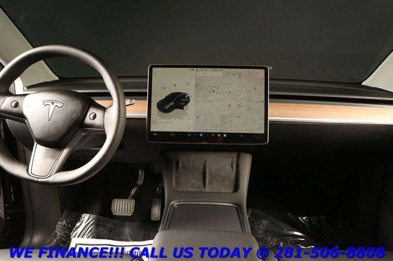 used 2023 Tesla Model Y car, priced at $29,495
