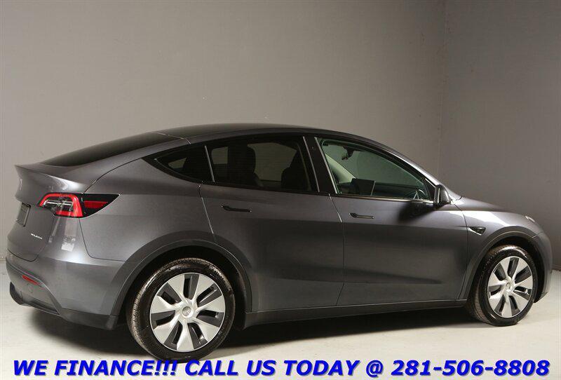 used 2023 Tesla Model Y car, priced at $29,495