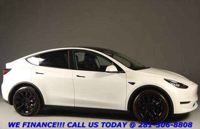 used 2023 Tesla Model Y car, priced at $30,995