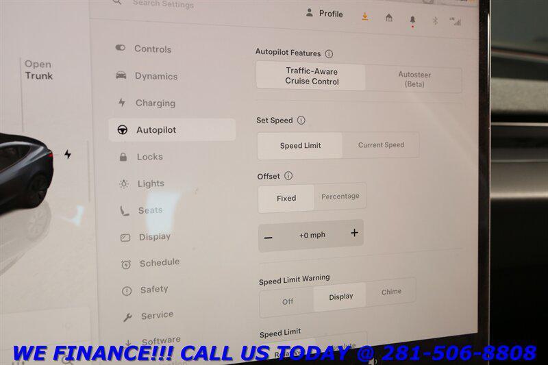 used 2025 Tesla Model 3 car, priced at $34,995